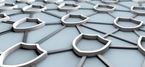 Image of security shield icons linked together in a chain made of metal depicting secure data protection.